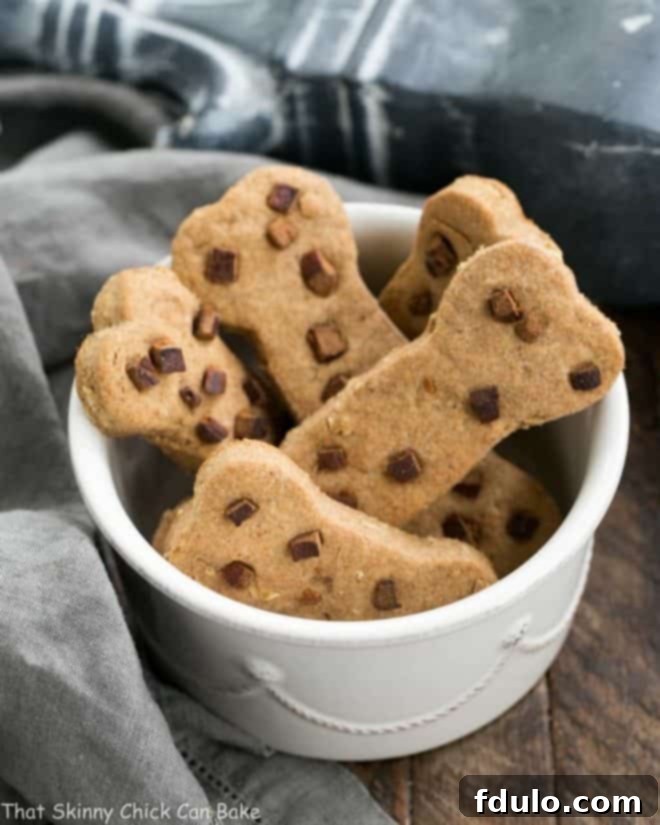 Peanut Butter Dog Bone Treats in a white dog bowl