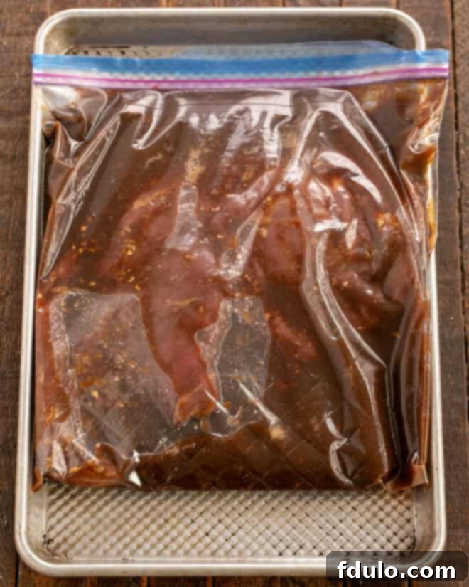 Step 2: Add flank steak to marinade in a dish or Ziploc bag.