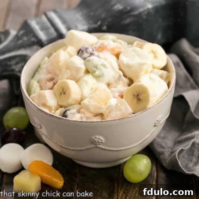 A festive Holiday Fruit Salad with various colorful fruits.