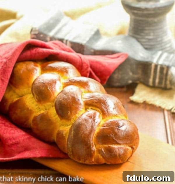 A beautifully braided Pumpkin Challah loaf.