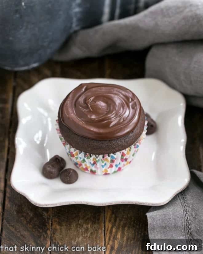 Cream Filled Chocolate Cupcakes on a square white ceramic plate