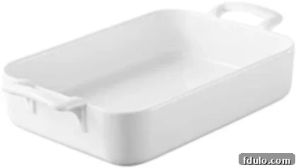 Large, elegant Revol ceramic baking dish in white