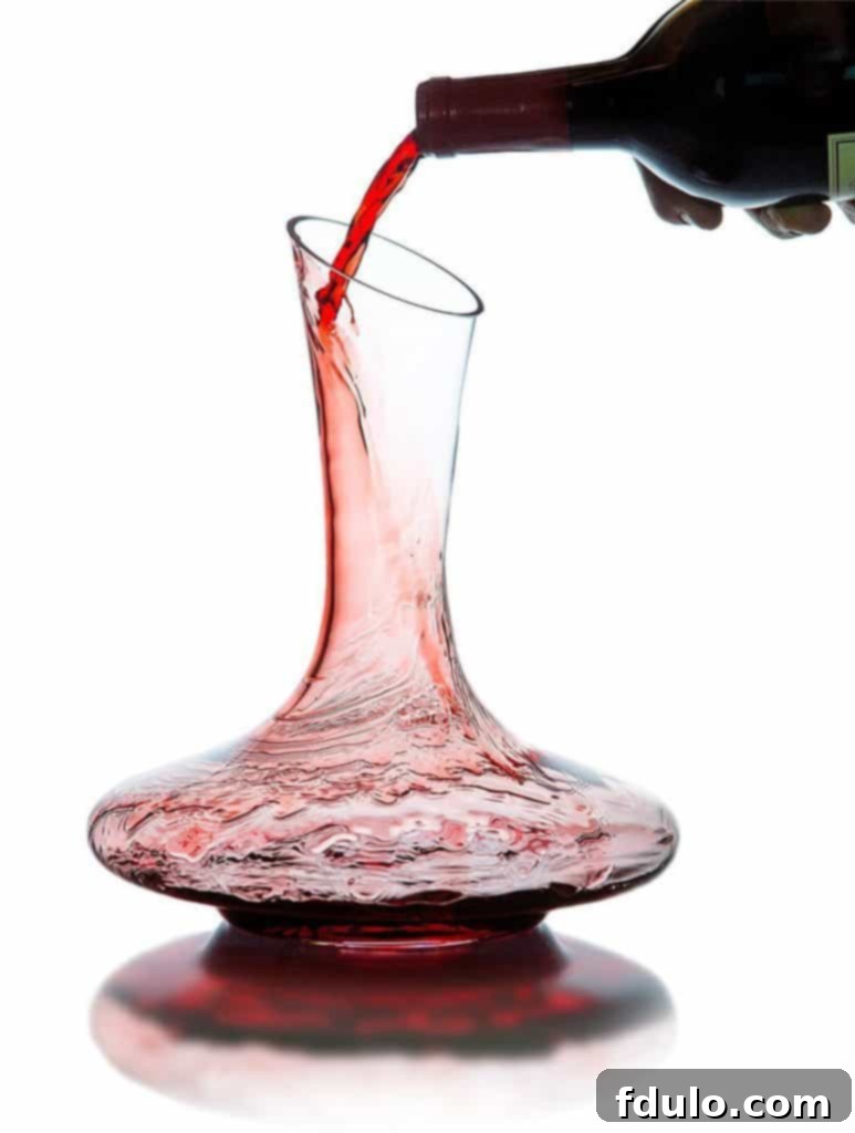 Elegant glass wine decanter by Le Chateau, designed to aerate and enhance wine