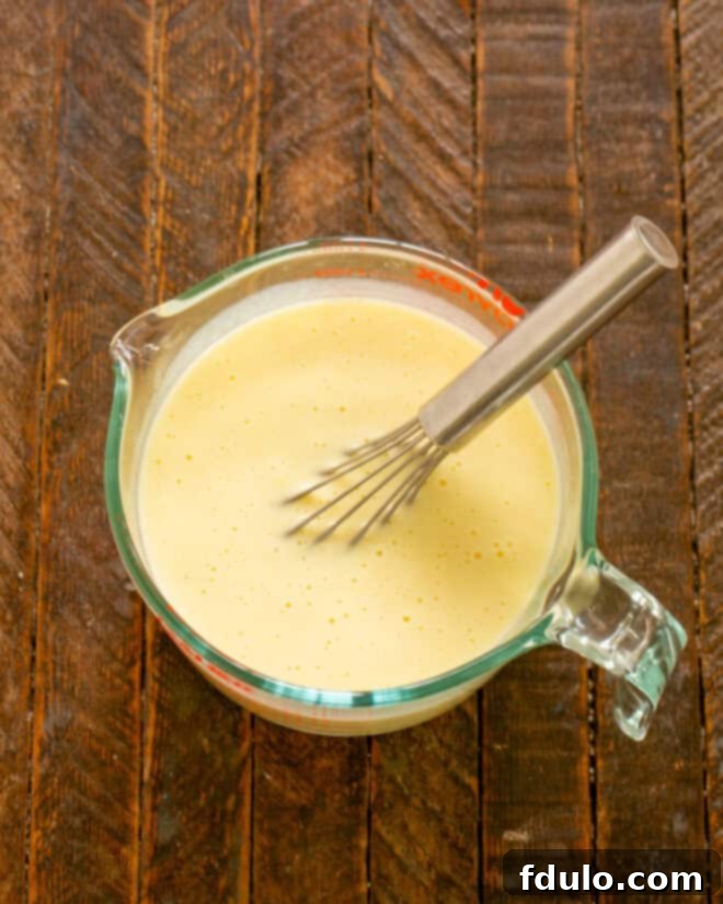 Step 2: Whisk in buttermilk into the egg mixture.