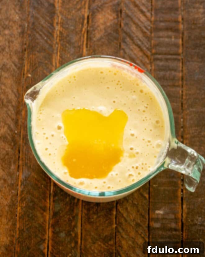 Step 4: Stir in the melted butter until just combined.