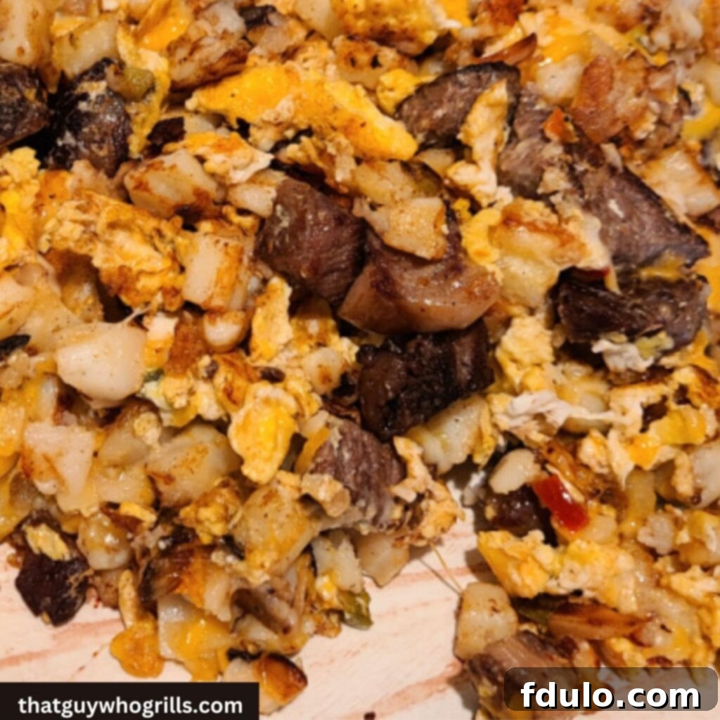 Prime Rib Breakfast Hash Cooked on Blackstone Griddle served on platter