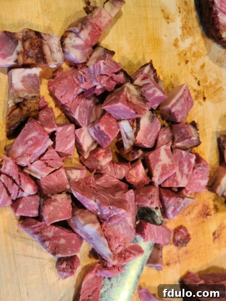 cut up Leftover Prime Rib on a cutting board