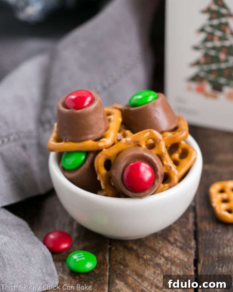 A small white bowl filled with Easy Rolo Pretzel Bites, showcasing the sweet and salty treat perfect for any occasion.