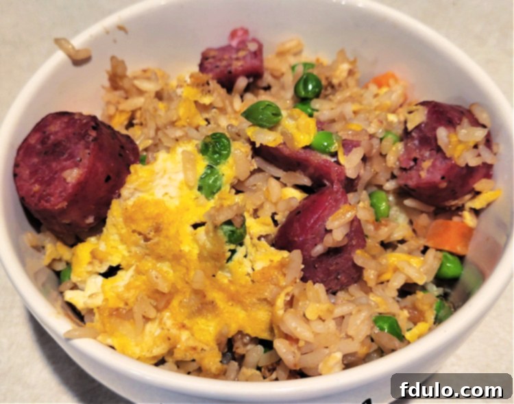 Blackstone Sausage Fried Rice Served in a Bowl