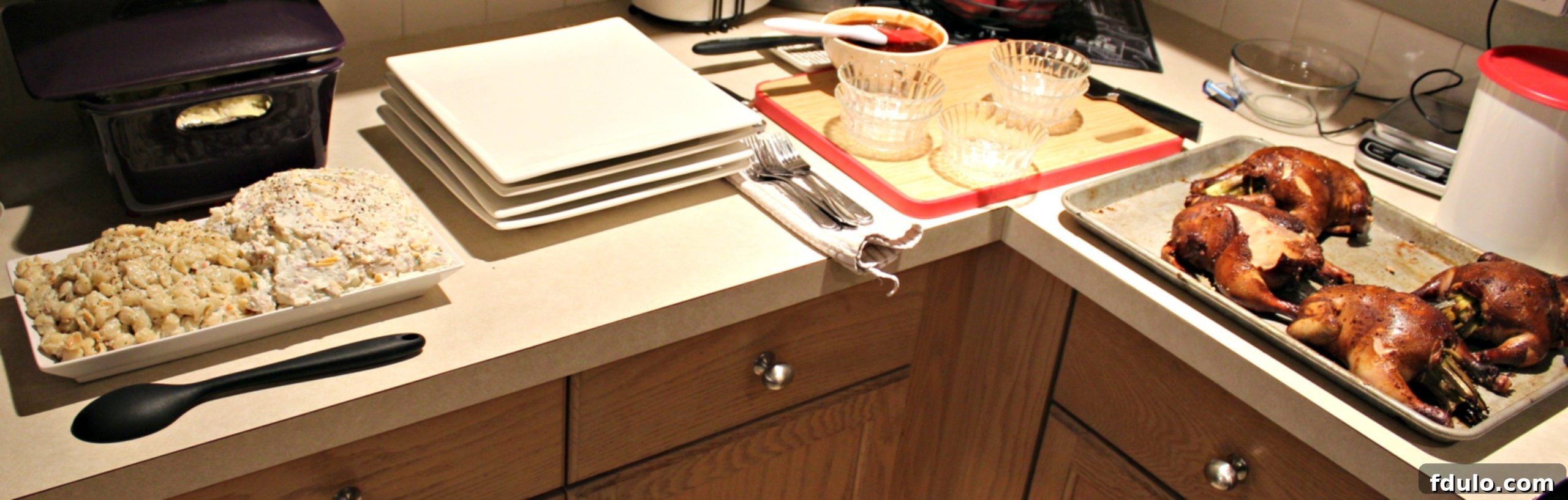 Smoked cornish game hens food spread on counters 