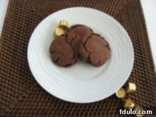 Tray of freshly baked Rolo cookies ready to cool