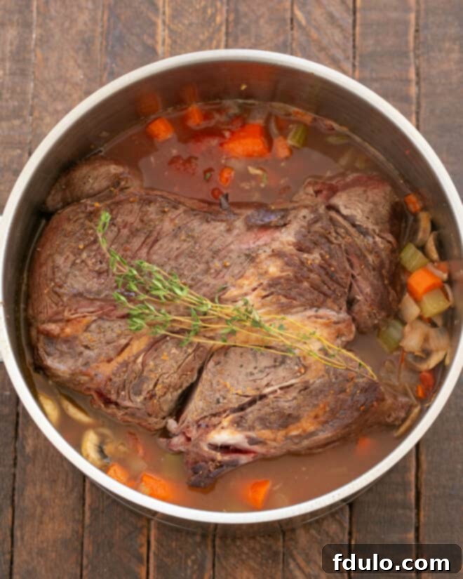 Red Wine Braised Pot Roast with Savory Mushrooms and Ripe Tomatoes 7 How to make pot roast process shot 5.