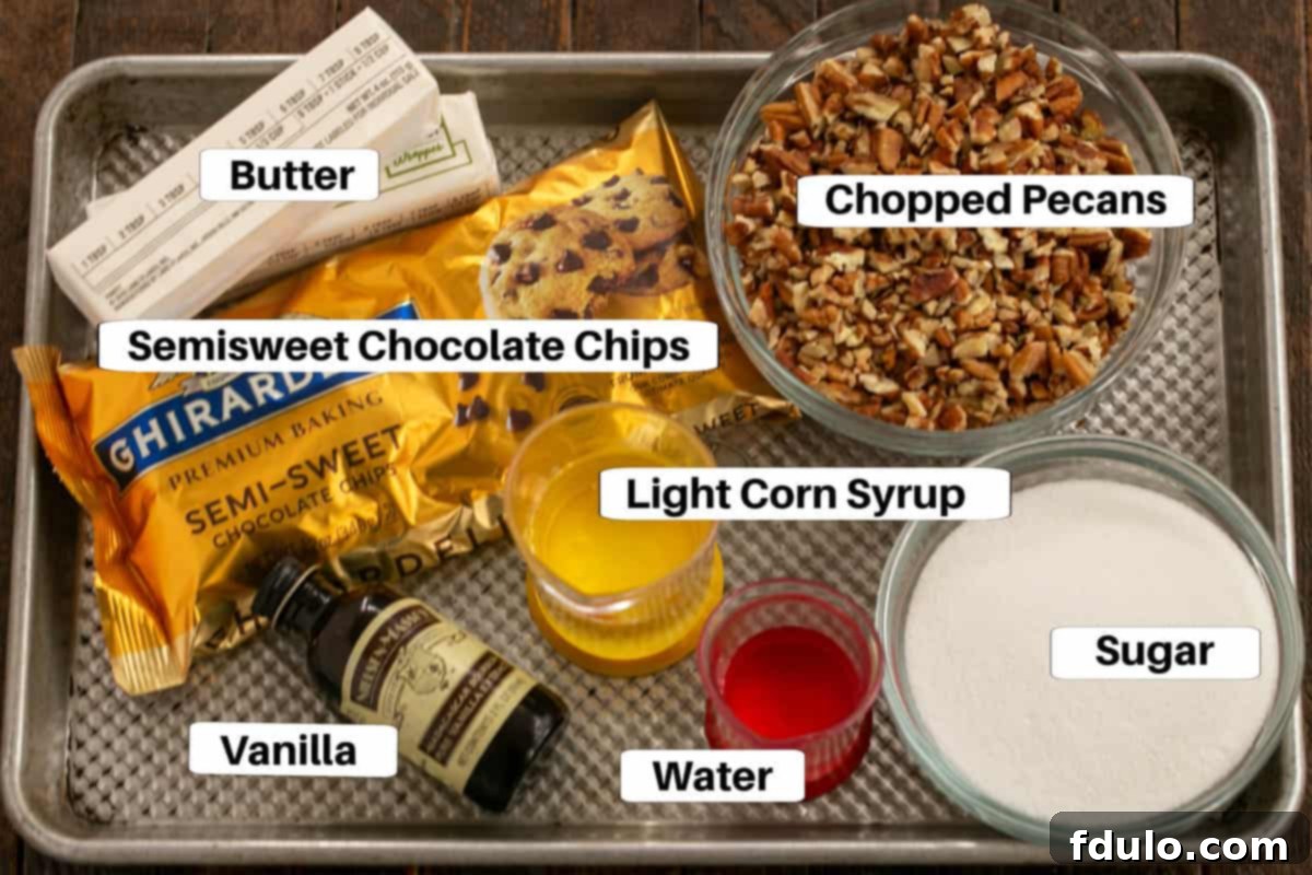 Overhead view of English toffee ingredients with labels, including butter, sugar, corn syrup, vanilla, chocolate chips, and pecans.