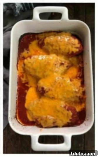 Step 4: Baked salsa chicken, bubbling with melted cheese, ready to be served hot from the oven.
