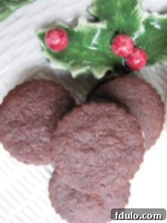 Rich Chocolate Sandwich Cookies 2 Close-up of a stack of freshly baked chocolate cookie halves ready for ganache filling