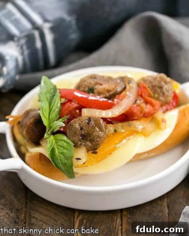Italian Sausage and Peppers served in a bun with melted Provolone cheese, ready to eat