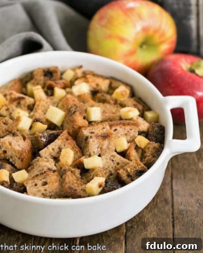 Gluten Free Apple Cinnamon Bread Pudding in a white ceramic casserole