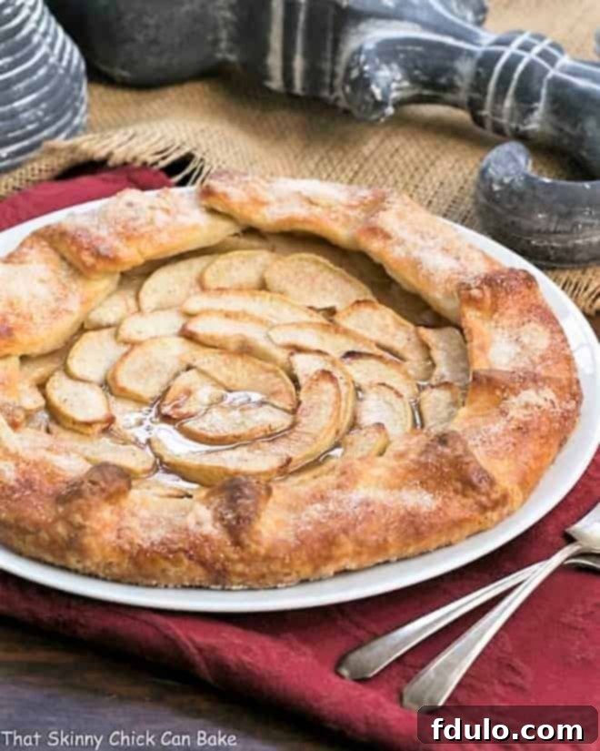 Irresistible Apple Recipes 6 A rustic maple glazed apple galette with a folded pastry crust.
