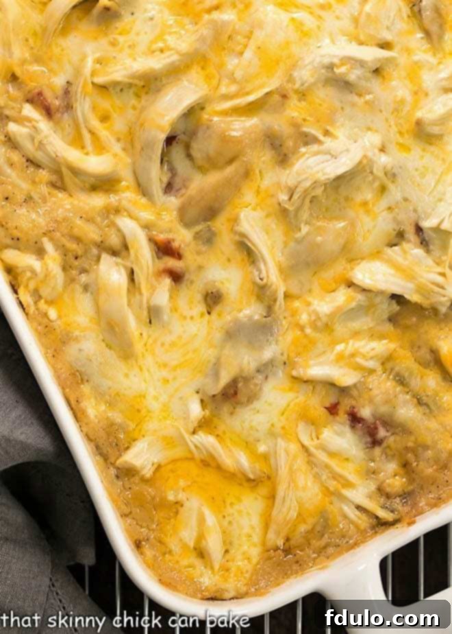 King Ranch Casserole from Scratch in a 9 x 13 casserole dish, fresh out of the oven with bubbling cheese.