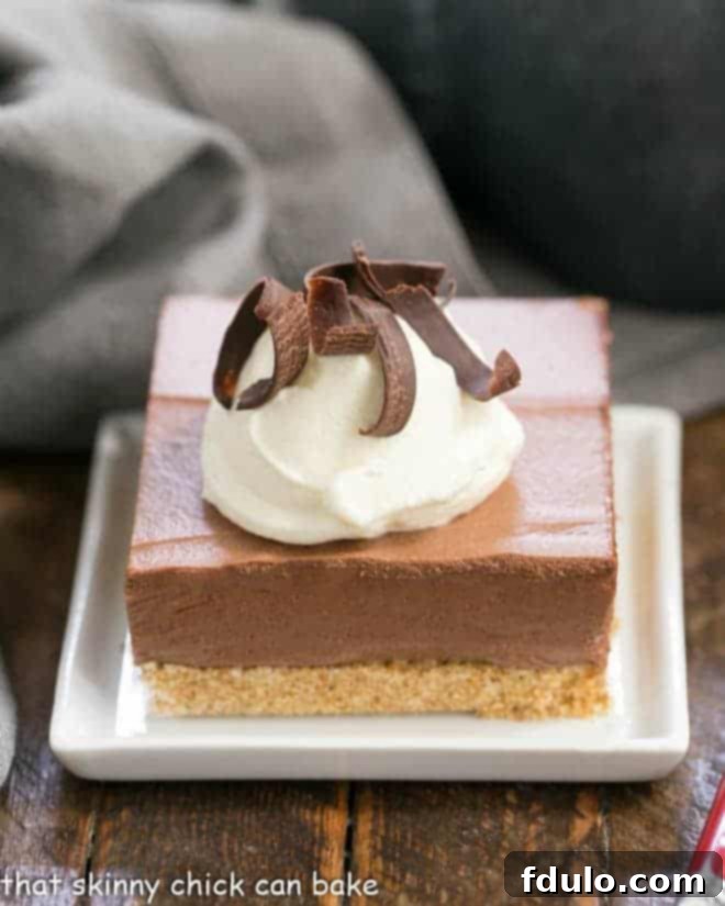 Easy chocolate mousse bars on a square white plate.