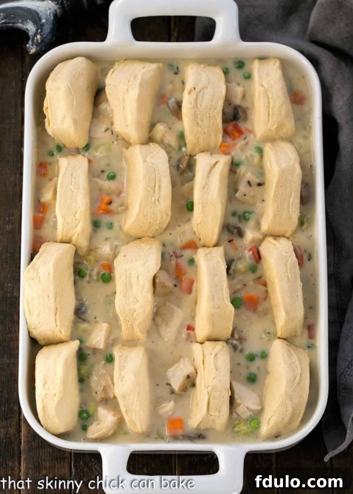 Cozy Homemade Chicken Pot Pie 4 How to arrange cut biscuits on the pot pie.