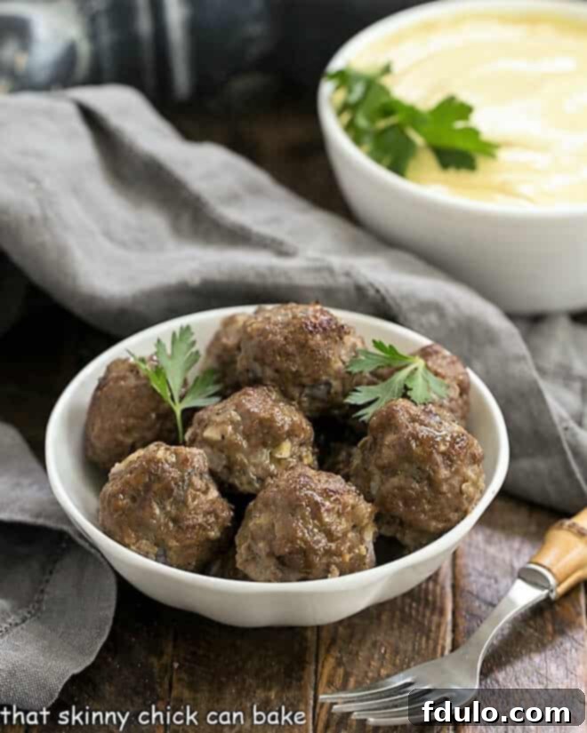 Indian Meatballs with Yogurt Sauce in white bowls