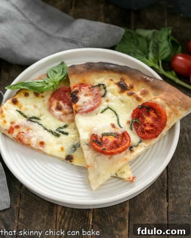 Two slices of pizza made with homemade pizza dough