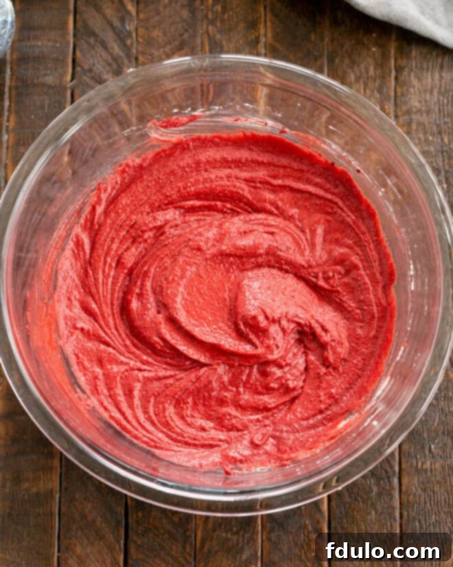 White Chocolate-Kissed Red Velvet Brownies 6 Red velvet paste mixed into batter.