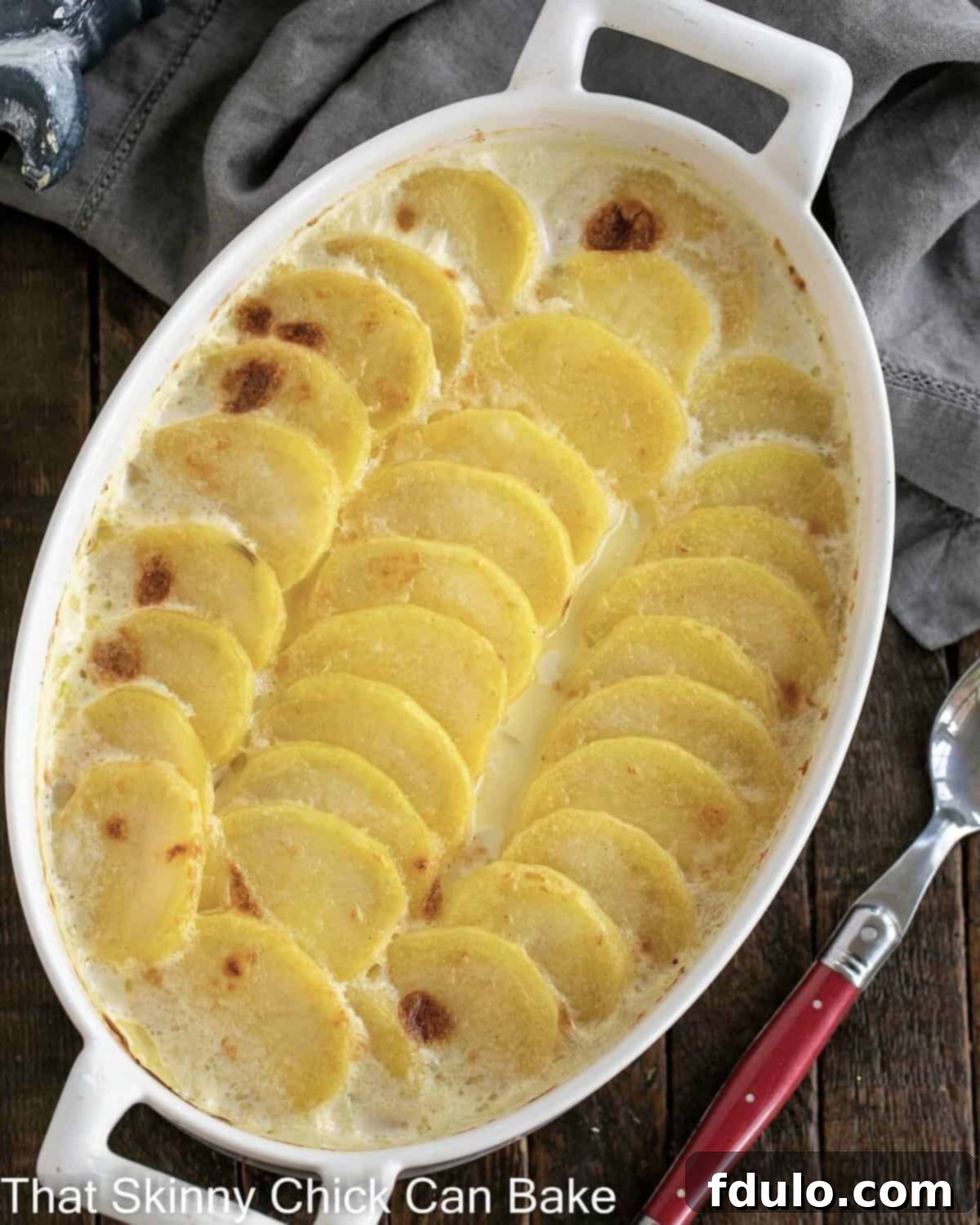 Overhead view of cheesy scalloped potatoes.