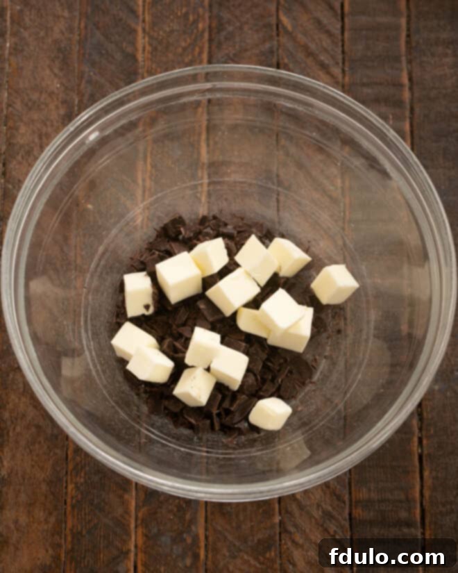 Step 1: Gently melt butter and chocolate in a bowl, stirring until smooth and glossy.