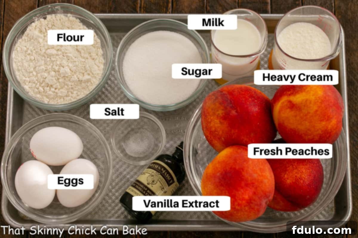 Luscious Peach Clafoutis 2 Fresh peach clafoutis ingredients neatly arranged on a metal sheet pan, labeled for clarity.