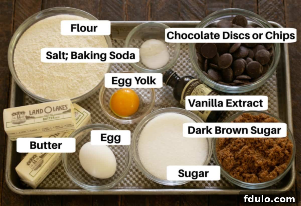 Next-Level Brown Butter Chocolate Chip Cookies 2 A beautifully arranged selection of Brown Butter Chocolate Chip Cookie ingredients, complete with informative labels, displayed on a pristine sheet pan.