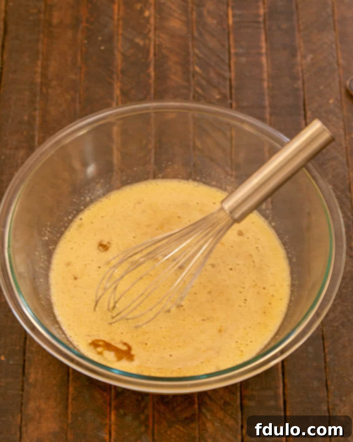 Step 3: Eggs, instant coffee, vanilla, and sugar whisked in a separate bowl.