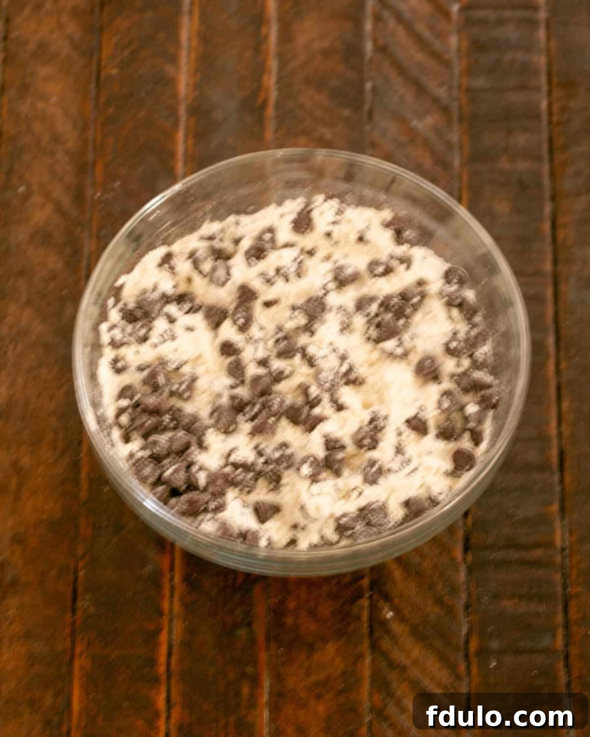 Step 6: Remaining chocolate chips added to the flour mixture.