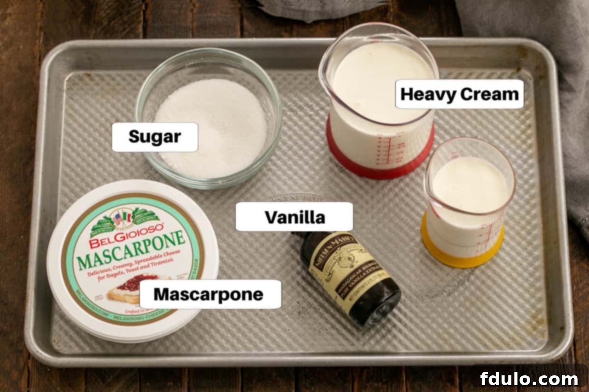 Mascarpone cheesecake layer ingredients with labels on a sheetpan, featuring cream cheese, eggs, and sugar.