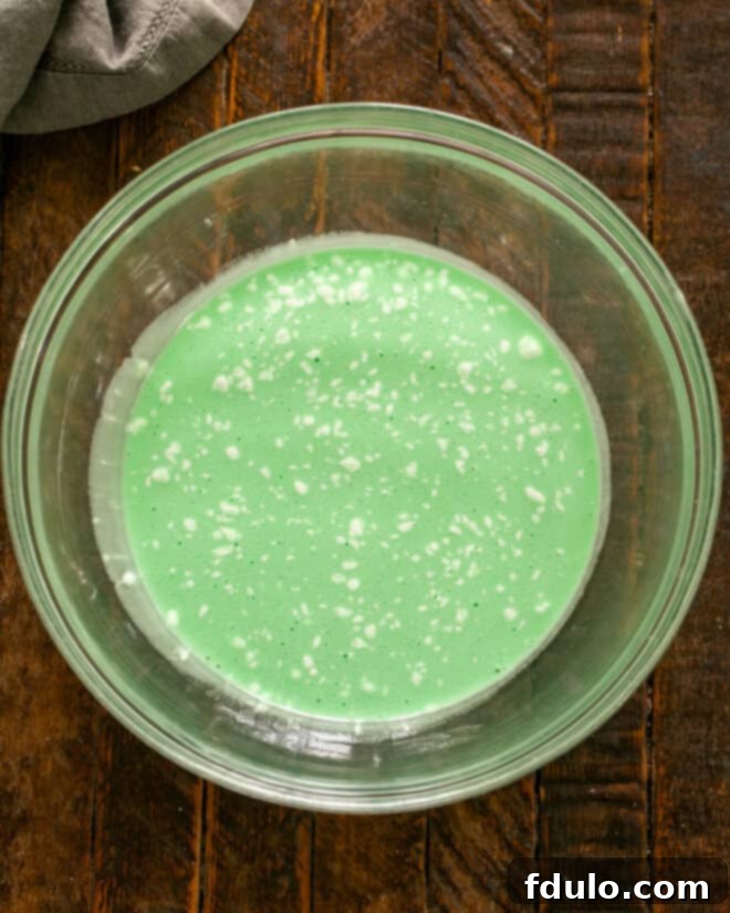 Step 3: The filling ingredients being blended together in a bowl using a hand mixer.