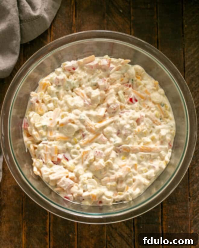 Tangy Corn Delight Dip 5 Step 3: Mixing all the ingredients together in a large bowl.