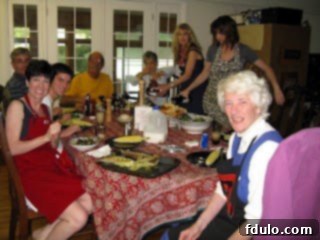 With my sisters and parents in my childhood home at our dining room table.