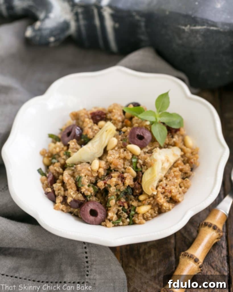 Mediterranean Quinoa Salad with Olives, Basil and Sun-dried Tomatoes | Loaded with flavor and simply dressed with olive oil and balsamic!