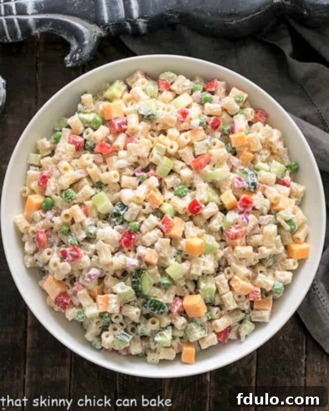 Overhead view of Vegetarian Pasta Salad in a large serving bowl, ready to be served.
