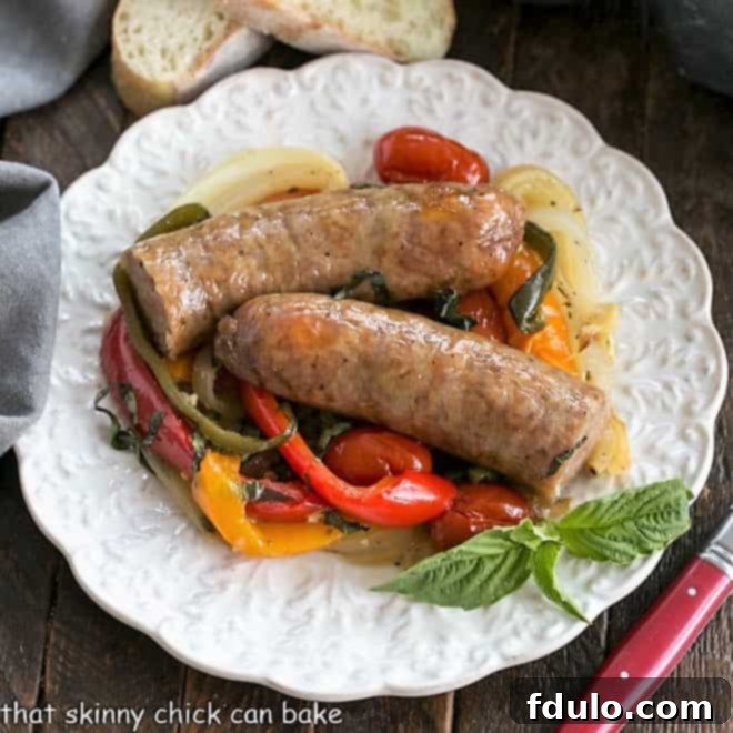 Overhead view of a plate of sheetpan sausage and peppers