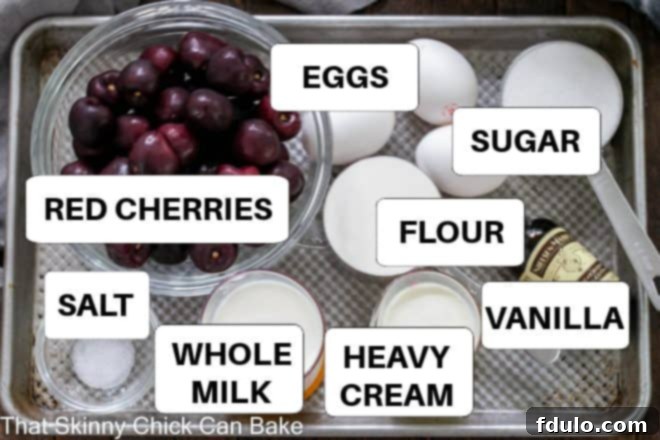 Cherry Clafoutis ingredients with labels on a sheet pan.