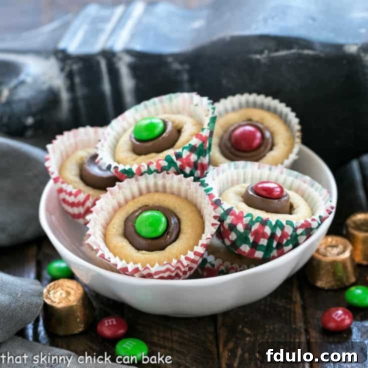 A charming white bowl brimming with freshly baked peanut butter cookie cups, ready to be enjoyed
