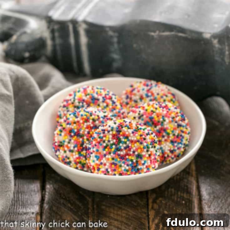 Sprinkle cookies in a shallow white ceramic bowl