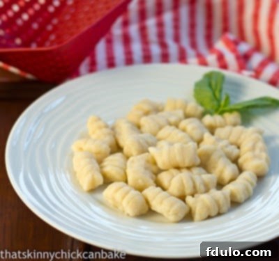 Ricotta Gnocchi without sauce on a white plate.